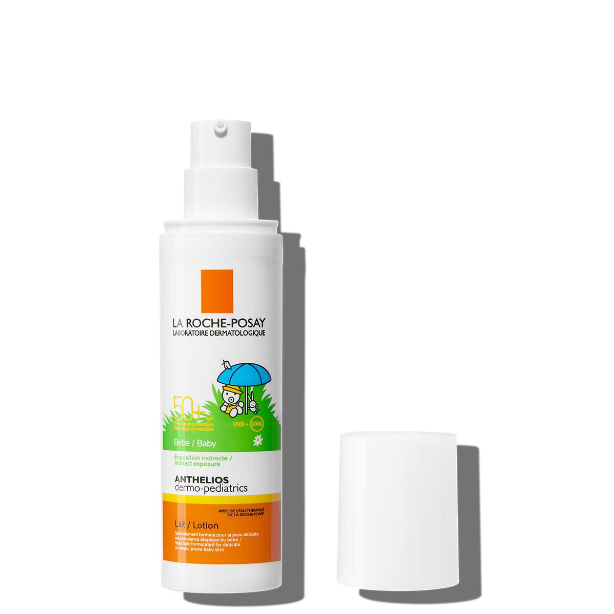 Confezione Anthelios dermo-pediatrics lozione SPF50+ con tappo accanto su sfondo bianco